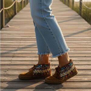 Suede moccasins with glitter and embellishments